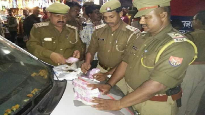 ballia police recovered 12 lakh rupees