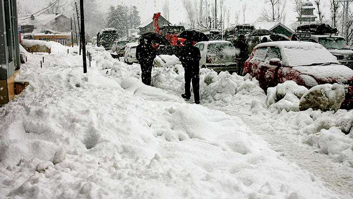 rain accompanied by snowfall in many parts of northern india