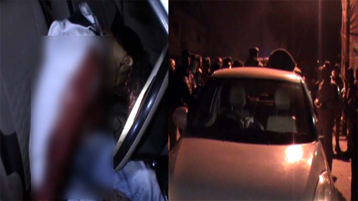man shot himself into car near police booth in lucknow